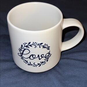 White Ceramic Mug with Blue Design